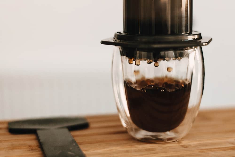 Coffee Drops Closeup In Glass, Aeropress, Alternative Coffee Bre